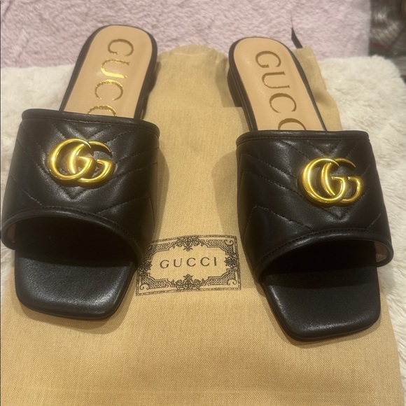 Gucci Black Quilted Mules with Gold Emblem - Picture 1 of 9
